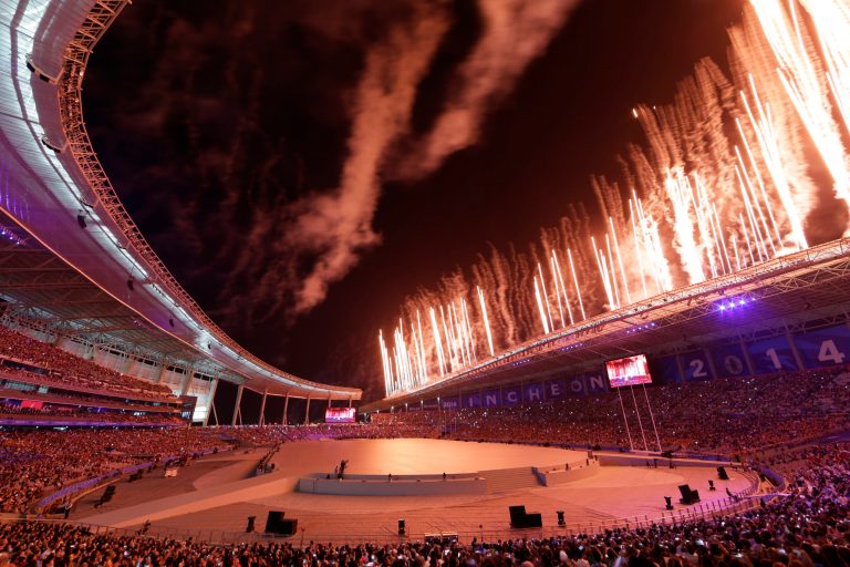 Fireworks explode from the roof of the Asiad Stadium during the opening ceremony for the 17th Asian Games in Incheon, South Korea,Friday, Sept. 19, 2014. (AP Photo/Dita Alangkara)