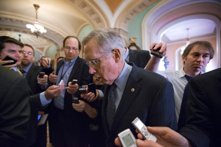 Senate Majority Leader Harry Reid of Nev. makes his way to the Senate floor on Capitol Hill in Washington, Thursday, Feb. 14, 2013, after a Democratic caucus meeting. Senate Democrats and the White House struggled to break an impasse Thursday over Chuck Hagel's nomination as secretary of defense, with Republicans blocking speedy confirmation of their former colleague and Vietnam combat veteran. (AP Photo/J. Scott Applewhite)