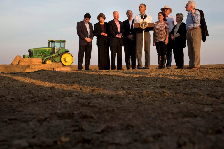 President Barack Obama, center, speaks about the drought after touring a local farm in Los Banos, Calif., Friday, Feb. 14, 2014. Obama will next travel to Rancho Mirage, Calif., to meet with Jordan's King Abdullah II. From second to left Sen. Dianne Feinstein, D-Calif., Calif. Gov. Jerry Brown, Agriculture Secretary Tom Vilsack, Obama, Maria Gloria Del Bosque, Empresas Del Bosque, Inc., Joe Del Bosque, Empresas Del Bosque, Inc., Sen. Barbara Boxer, D-Calif., and Rep. Jim Costa, D-Calif. (AP Photo/Jacquelyn Martin)