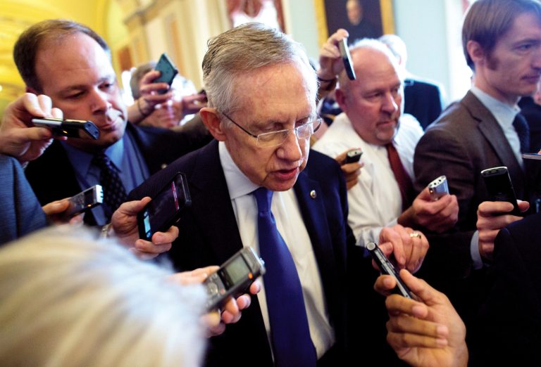 Senate Majority Leader Sen. Harry Reid, D-Nev., is surrounded by reporters on Capitol Hill. (AP/ Evan Vucci)
