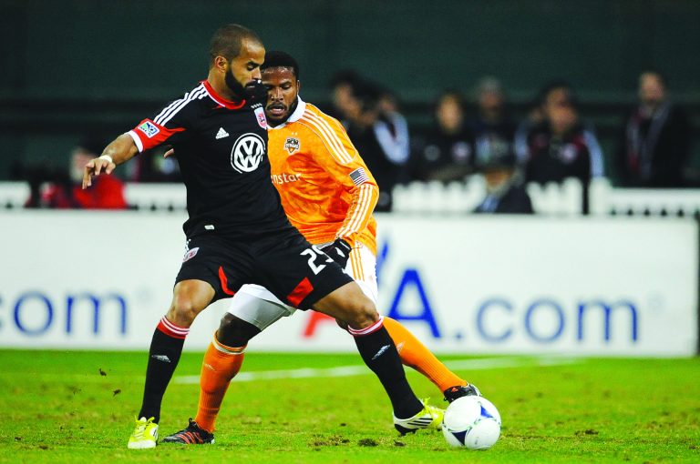WASHINGTON, DC - NOVEMBER 18:  Maicon Santos #29 of D.C. United battles for the ball against Jermaine Taylor #4 of Houston Dynamo during leg 2 of the Eastern Conference Championship at RFK Stadium on November 18, 2012 in Washington, DC.  (Photo by Patrick McDermott/Getty Images)