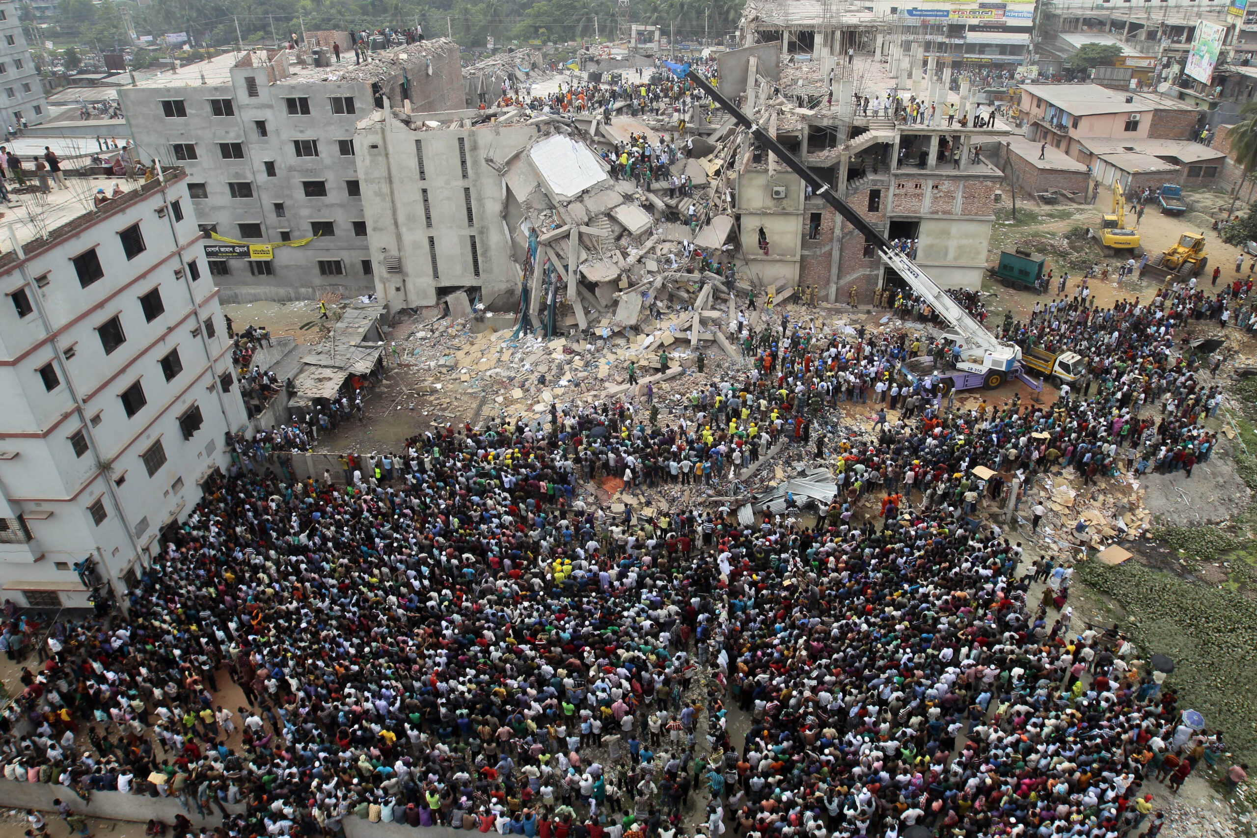 Workers pinned in Bangladesh rubble cry for rescue