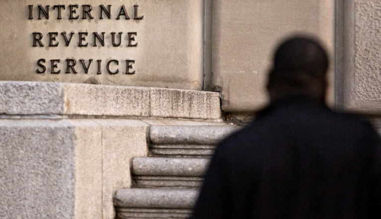 The IRS cannot predict what loopholes and workarounds corporations and individuals might find under the revised tax code Republicans are expected to pass Tuesday. (Andrew Harrer/Bloomberg)