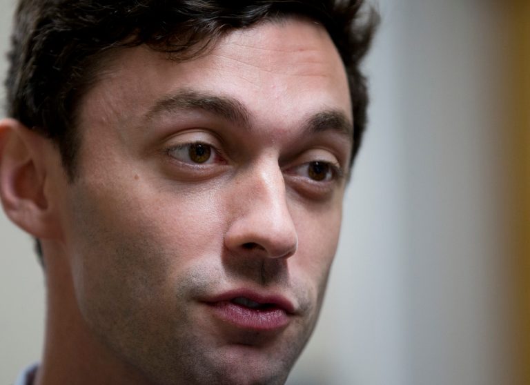 Democratic candidate for Georgia's Sixth Congressional Seat Jon Ossoff talks with reporters at a campaign field office Tuesday, April 18, 2017, in Marietta, Ga. (AP Photo/John Bazemore)