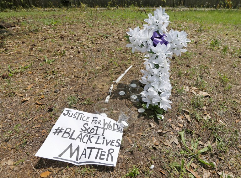 Walter Scott was killed by a North Charleston police officer after a traffic stop on April 4, 2015. The officer, Michael Thomas Slager, has been charged with murder. (AP Photo/Chuck Burton)