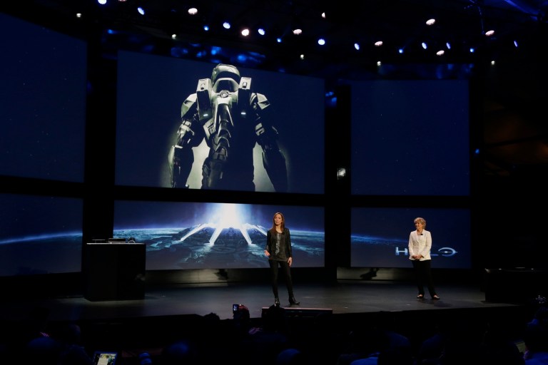 FILE - In this May 21, 2013 file photo, Nancy Tellem, right, the entertainment and digital media president of Microsoft, and Bonnie Ross, left, general manager and studio head of 343 Industries, announce a new Halo live-action TV series for Xbox Live, during an event to unveil the next-generation Xbox One entertainment and gaming console system, in Redmond, Wash. Master Chief is returning to the battlefield next year. Microsoft announced plans Friday, May 16, 2014, to release the video game sequel 