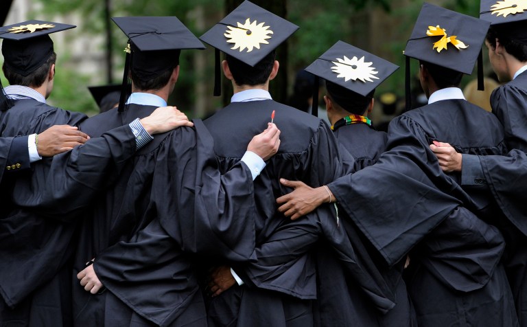 Throughout the past 25 years, the cost of attending college has quadrupled. (AP Photo/Jessica Hill, File)