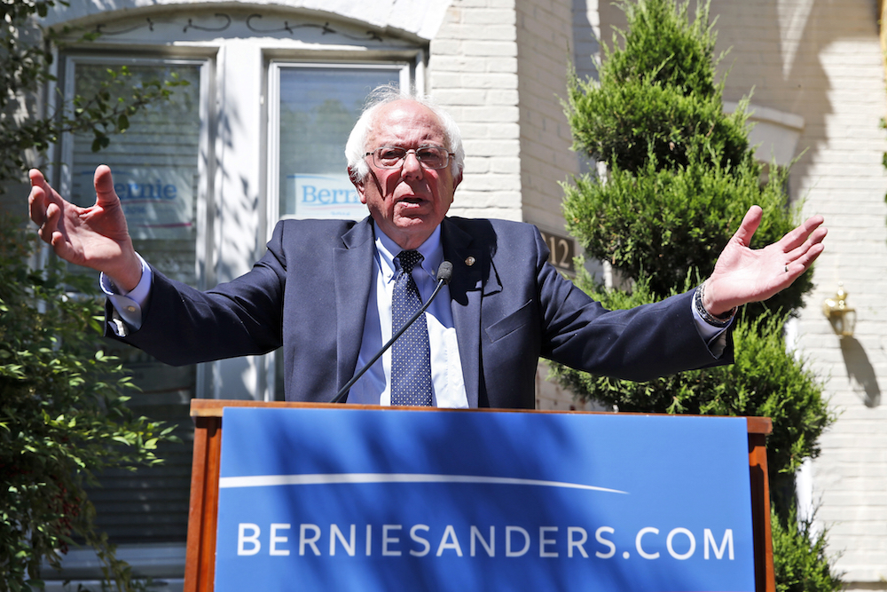 Sanders stops short of conceding, but getting ready to help Clinton