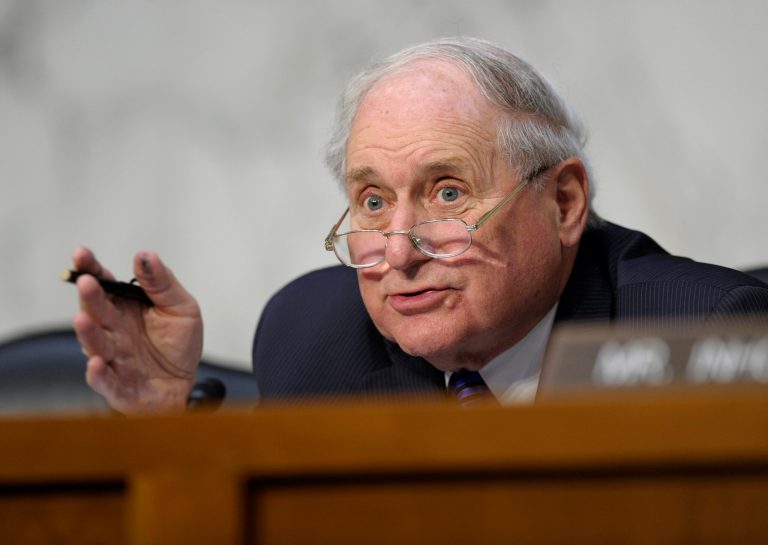 In this June 4, 2013, file photo, Sen. Carl Levin, D-Mich. speaks on Capitol Hill in Washington.  Executives from manufacturing giant Caterpillar Inc. are heading to Capitol Hill to explain what Levin calls an aggressive strategy to avoid paying billions of dollars in U.S. taxes. (AP Photo/Susan Walsh, File)