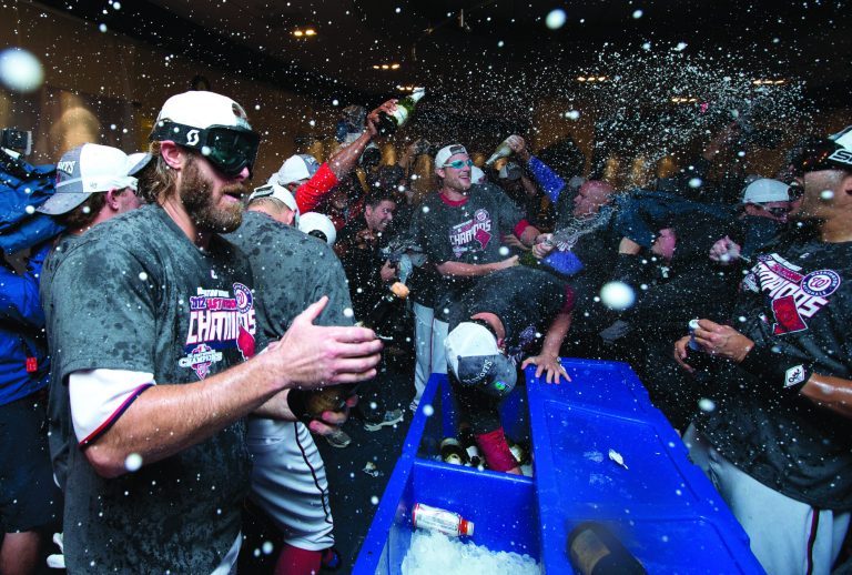 Nationals right fielder Jayson Werth, left, celebrated with teammates after clinching the National League East title. (AP photo)