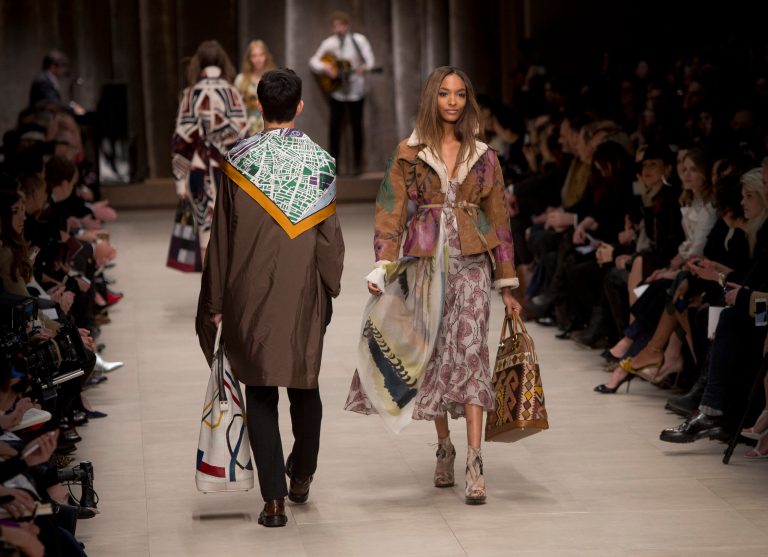 Model Jourdan Dunn wears a design created by Burberry Prorsum Womenswear during London Fashion Week Autumn/Winter 2014, at Perks Field, Kensington Palace, in Hyde Park, central London, Monday, Feb. 17, 2014. (Photo by Joel Ryan/Invision/AP)