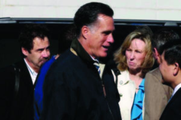 Comedian Dennis Miller, left, with presidential candidate Mitt Romney in Virginia Wednesday. AP Photo