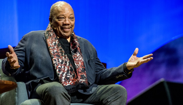 Quincy Jones said the U.S. has a long way to go to solve racism and Trump isn't helping. (Photo by Amy Harris/Invision/AP)