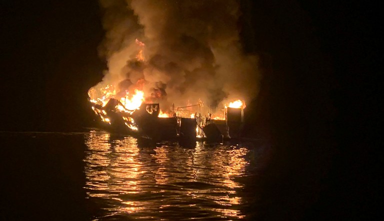 In this photo provided by the Santa Barbara County Fire Department, a dive boat is engulfed in flames after a deadly fire broke out aboard the commercial scuba diving vessel off the Southern California Coast, Monday morning, Sept. 2, 2019.