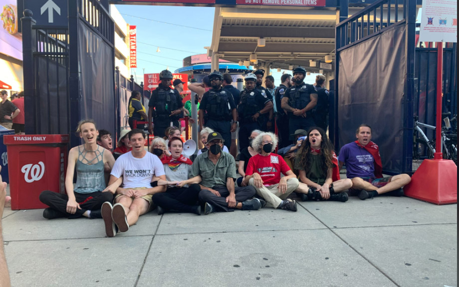 SEE IT: Protesters make a scene outside Congressional Baseball Game