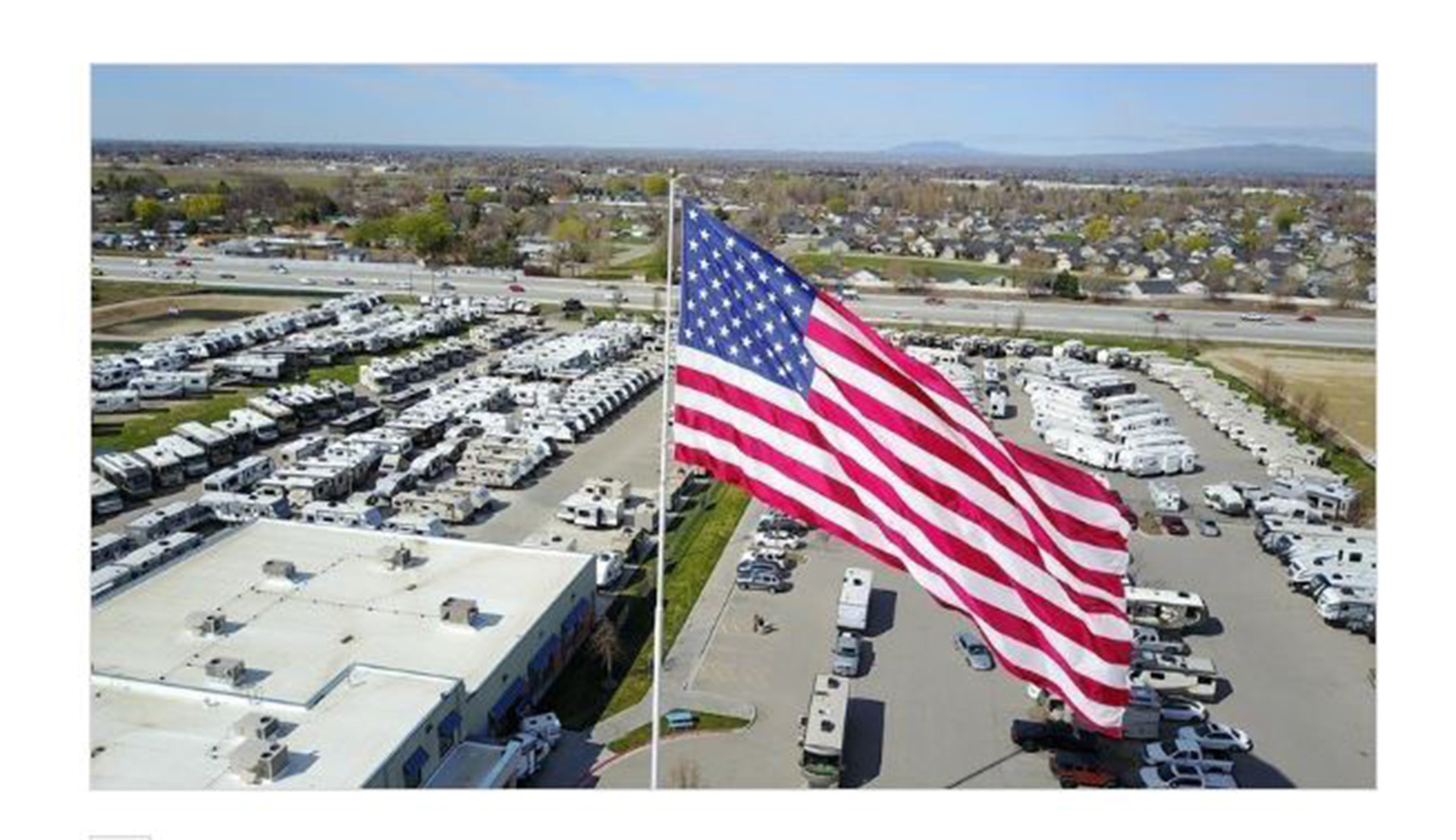 RV dealership refuses to take down massive American flag after city claims it violates ordinance