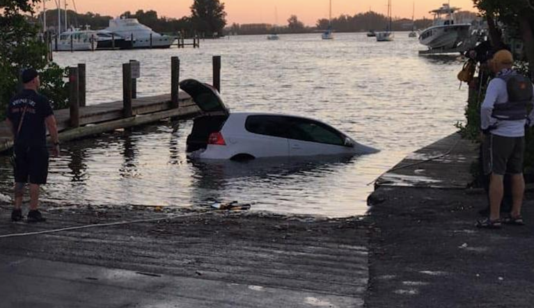 Woman rescued after being trapped in submerged car for 10 hours