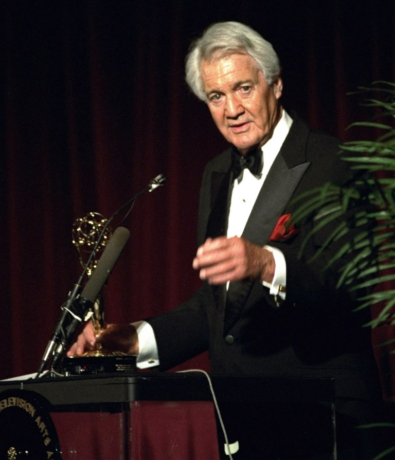 FILE - In this April 19, 1994, file photo, Pat Summerall, completing his 34th and final season with CBS, receives an award for lifetime achievement at the 1994 Sports Emmy Awards in New York. Fox Sports spokesman Dan Bell said Tuesday, April 16, 2013, that Summerall, the NFL player-turned-broadcaster whose deep, resonant voice called games for more than 40 years, has died at the age of 82. (AP Photo/Rob Clark, File)