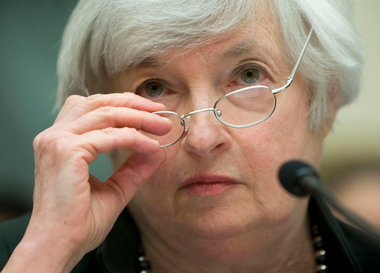 Federal Reserve Chair Janet Yellen removes her glasses as she testifies on Capitol Hill in Washington, Wednesday, July 16, 2014, before the House Financial Services Committee hearing entitled: 