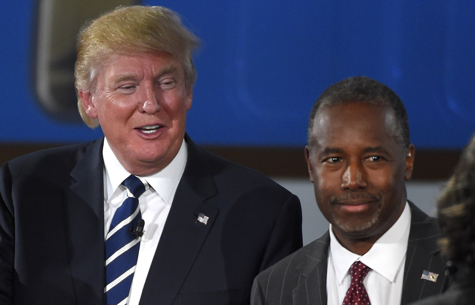 Trump defends Carson amid backlash for gun comments