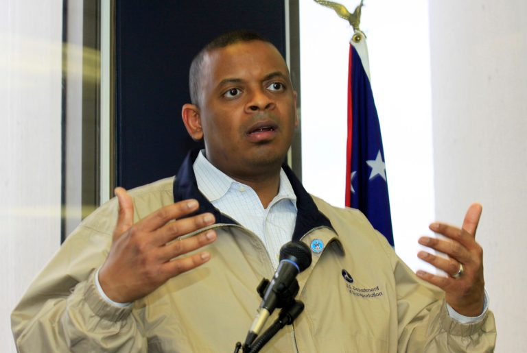 This photo taken April 14, 2014 shows Transportation Secretary Anthony Foxx speaking to the media and local government officials about federal transportation funding at the Montgomery County Commissioner's office in Dayton, Ohio. On the road in a tour bus this week, Foxx is urging Congress to quickly approve legislation to pay for highway and transit programs amid warnings that the U.S. governmentÃ?s Highway Trust Fund is nearly broke. If allowed to run dry, that could threaten to set back or shut down projects across the country, force widespread layoffs of construction workers and delay needed repairs and improvements. (AP Photo/Skip Peterson)