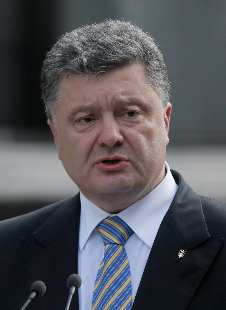 In this photo taken on Saturday, Aug. 23, 2014, Ukraine's President Petro Poroshenko makes a statement to the press in Kiev, Ukraine. Poroshenko on Monday, Aug. 25,  dissolved parliament and called for early elections in October 26 as his country continues to battle a pro-Russian insurgency in its eastern regions. (AP Photo/Efrem Lukatsky)
