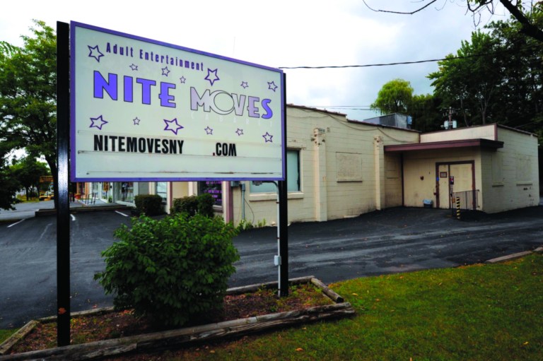 This Wednesday, Sept. 5, 2012 photo shows Nite Moves Gentlemen's club in Latham, N.Y., Wednesday Sept. 5, 2012. The New York strip club says its nude lap dances are an art form and should be exempt from state taxes. The state tax department and an appeals court disagree and want the Nite Moves club in Albany to pay $124,000. New York's highest court hears the arguments Wednesday. Tax officials say sales taxes are owed on so-called 