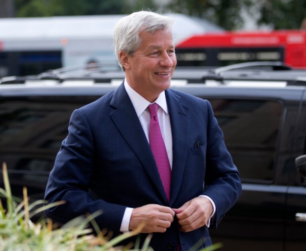 Jamie Dimon avoiding Davos limelight as record fines impede bank trust