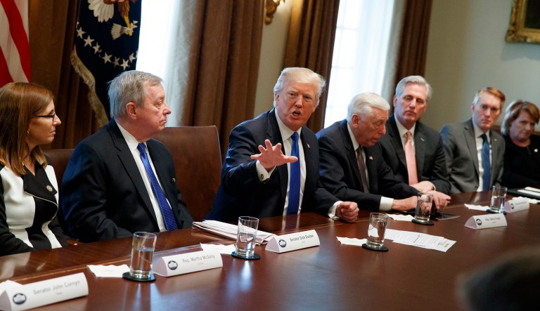 President Trump speaks during a meeting with bipartisan lawmakers on immigration policy in the White House. Some journalists said they can remember no other president inviting members of the press to watch negotiations before. (AP Photo/Evan Vucci)