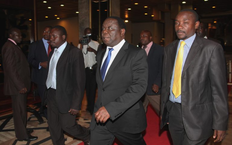 Zimbabwean Prime Minster Morgan Tsvangirai, center, arrives for talks with South African President Jacob Zuma in Harare, Zimbabwe, Wednesday, Aug. 15, 2012. Zuma, the chief regional mediator on Zimbabwe, arrived in Harare for talks with the leaders of the nation's troubled coalition government. The Harare talks are expected to focus on internal disagreements on a new Zimbabwe constitution and a timetable toward new elections.  (AP Photo/Tsvangirayi Mukwazhi)