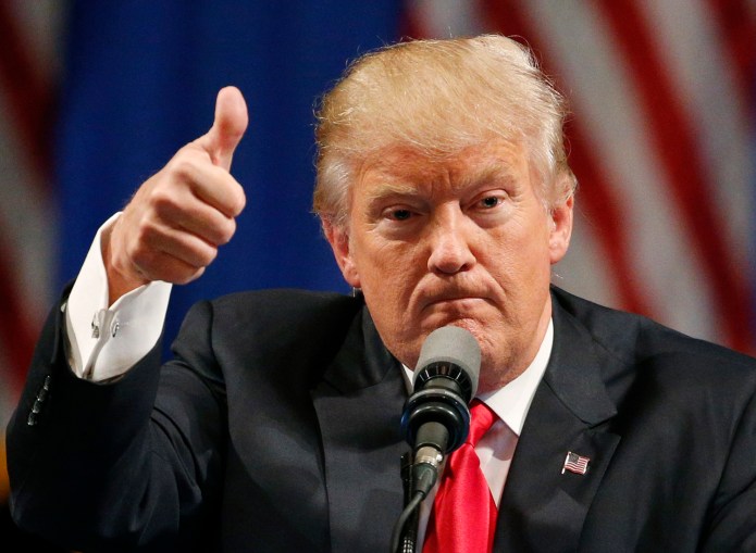 Trump's transition team quickly faced questions about whether the president-elect maintained a financial interest in Boeing after he took to social media to call for the cancellation of a federal contract with the company to build the new Air Force One. (AP Photo/John Locher, File)