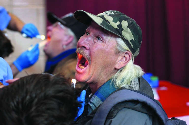 A new study says Americans expect too much from the healthcare system and should accept European style cuts to make it affordable.  (Photo by John Moore/Getty Images)