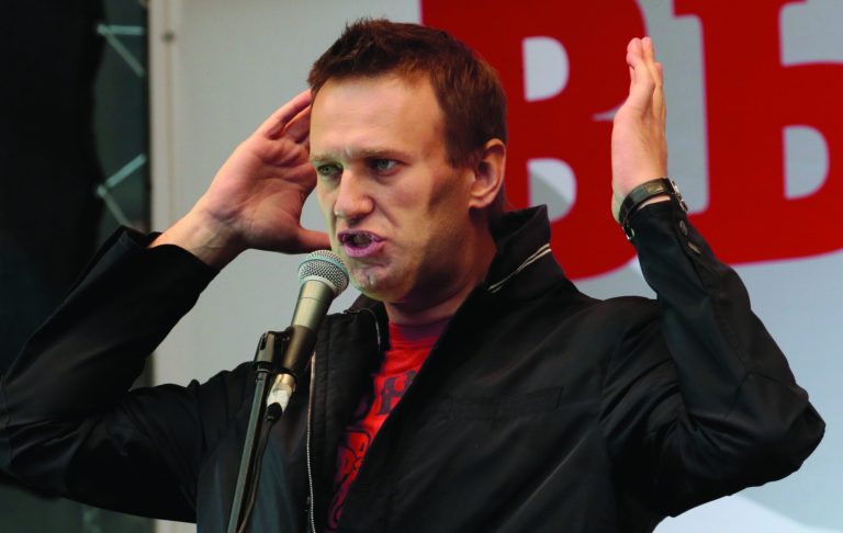 Opposition leader Alexei Navalny speaks at a protest rally in Moscow, Saturday, Sept. 15, 2012. Thousands of protesters marched across downtown Moscow on Saturday in the first major rally in three months against President Vladimir Putin, while defying the Kremlin's ongoing efforts to crackdown on opposition. (AP Photo/Mikhail Metzel)
