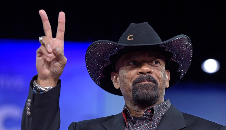 The tweet also included a violent photoshopped image of David Clarke kicking CNN in the face. (AP Photo/Susan Walsh File)