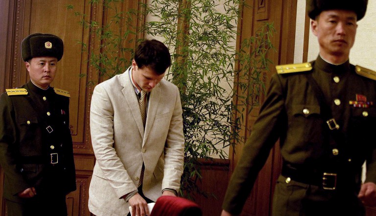 American student Otto Warmbier, center, arrives at the People's Cultural House, as Warmbier is presented to reporters Monday, Feb. 29, 2016, in Pyongyang, North Korea.