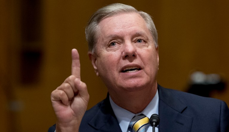 After cracking the joke, Sen. Lindsey Graham went on to defend President Trump. (AP Photo/Andrew Harnik)