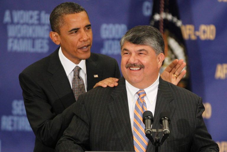 President Obama stands with AFL-CIO President Richard Trumka after he spoke about jobs and the economy at the AFL-CIO Executive Council in Washington in 2010. (AP Photo/Charles Dharapak)