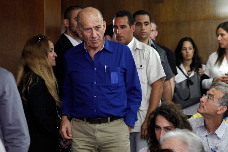 Israel's former Prime Minister Ehud Olmert at the Tel Aviv District Court in Israel, Tuesday, May 13, 2014. Olmert was sentenced on Tuesday to six years in prison for his role in wide-ranging bribery case, capping a stunning fall from grace for one of the most powerful men in the country. (AP Photo/Finbarr O'Reilly, Pool)