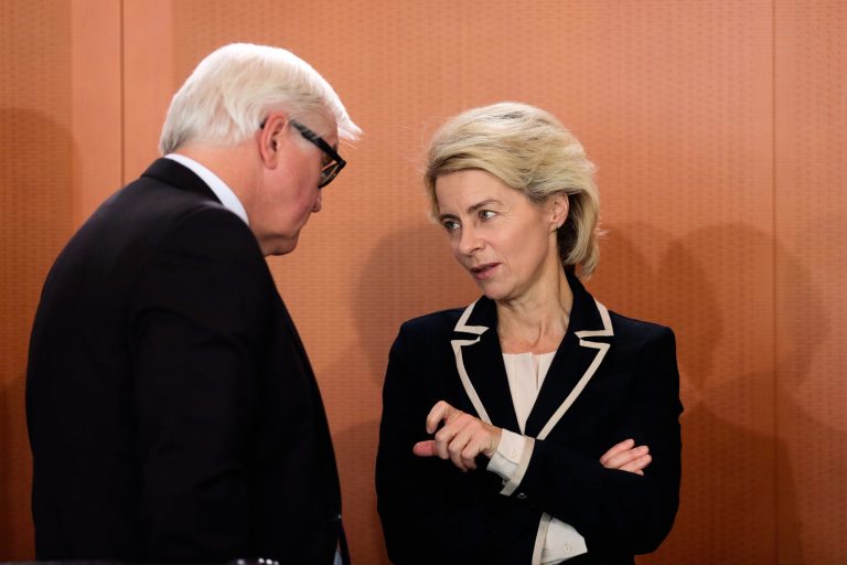German Defense Minister Ursula von der Leyen, right, speaks with Foreign Minister Frank-Walter Steinmeier prior to the weekly cabinet meeting at the chancellery in Berlin, Wednesday, July 2, 2014. (AP Photo/Markus Schreiber)