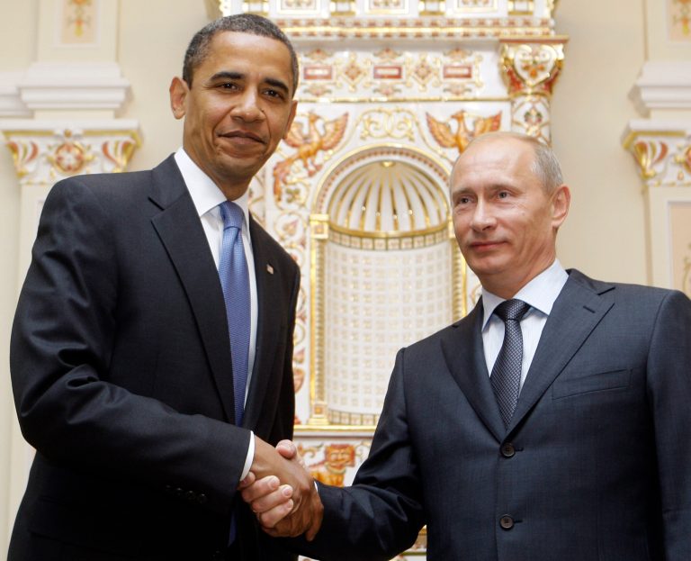   FILE - In this July 7, 2009 file photo, President Barack Obama shakes hands with then-Russian Prime Minister Vladimir Putin in Moscow. With global anxiety rising, President Barack Obama is searching for bolder, swifter signals from Europe that it will contain its fiscal mess and keep it from torpedoing the U.S. economy and his re-election chances along with it. Yet as he prepares to plunge into summit talks with the other world leaders, Obama is down to the power of persuasion and little else. (AP Photo/Haraz N. Ghanbari, File)  