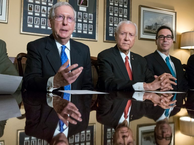 In this Nov. 9, 2017, file photo, from left, Senate Majority Leader Mitch McConnell, R-Ky., Senate Finance Committee Chairman Orrin Hatch, R-Utah, and Treasury Secretary Steven Mnuchin, speak to reporters as work gets underway on the Senate's version of the GOP tax reform bill, on Capitol Hill in Washington. More than a quarter of all taxpayers in a majority of states claim a long-standing federal deduction that is targeted by the Republicans' tax-overhaul plans in Congress. Residents in high-tax, Democratic-led states could be the hardest hit by the proposed change to the deduction for state and local taxes, but it also could alter the bottom line for millions of others who itemize deductions. (AP Photo/J. Scott Applewhite, File)