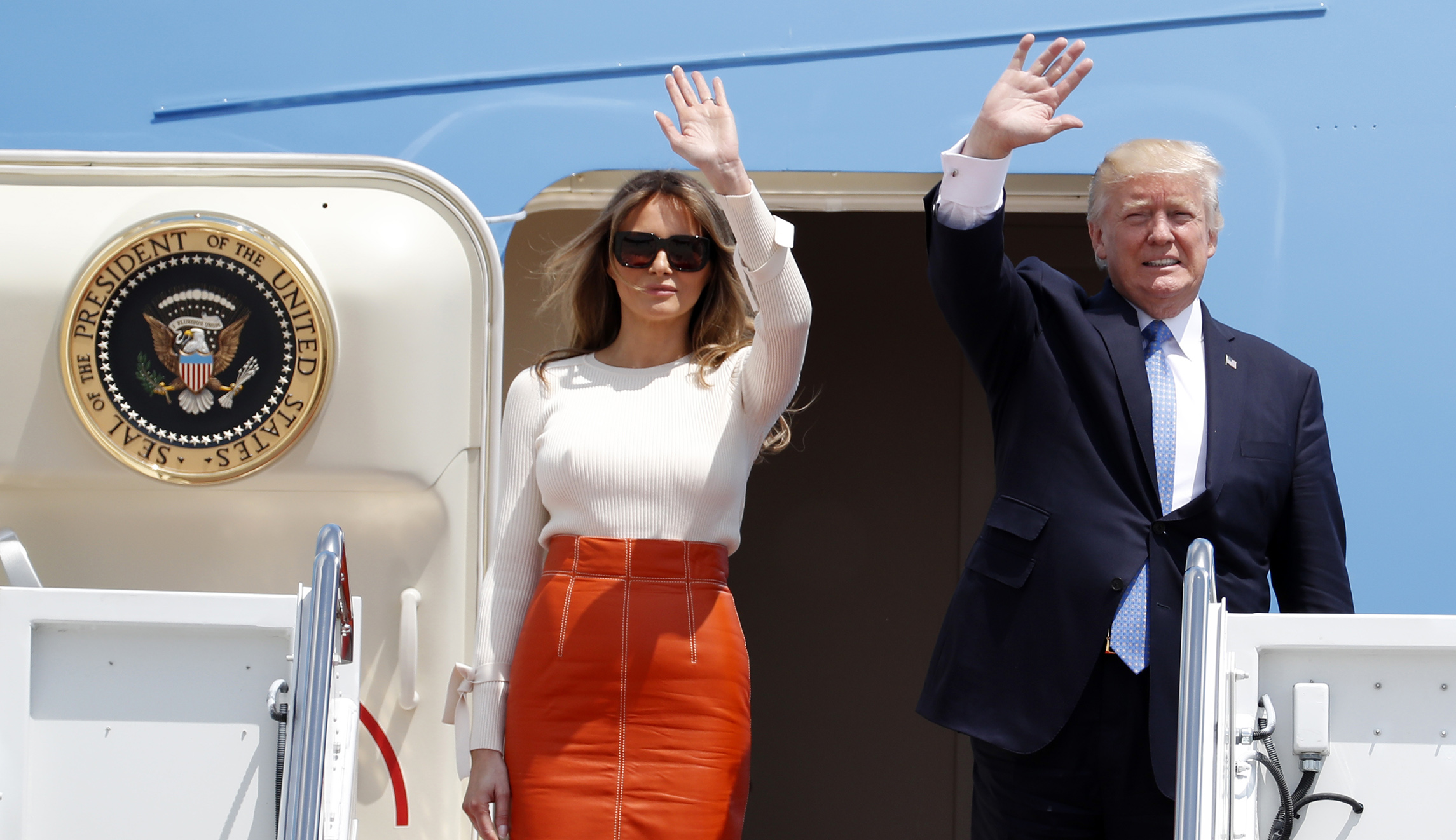 Trump takes off for overseas debut amid scandal storm at home