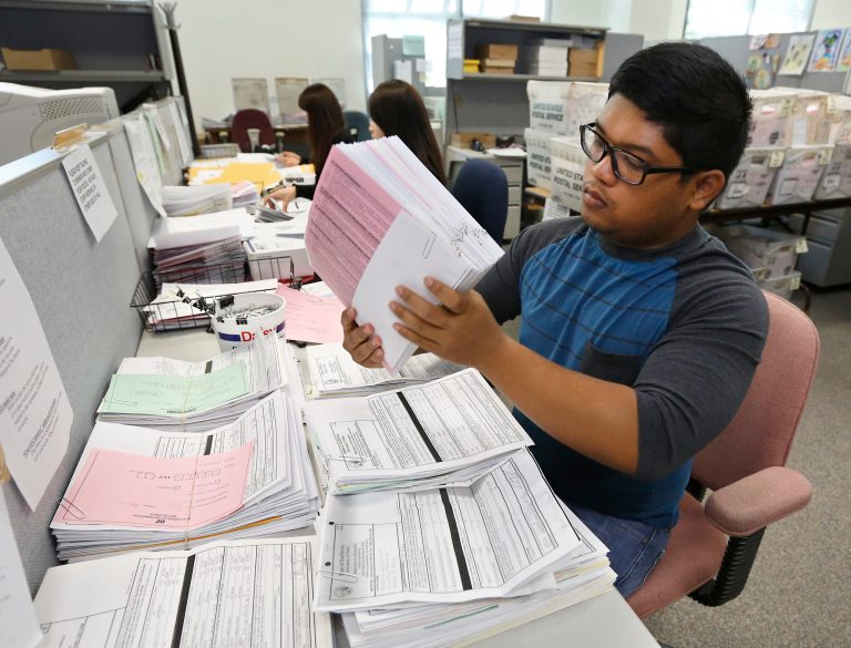 More than 50 business groups asked a Texas court to throw out the new rule, which takes effect Dec. 1. (AP Photo/Rich Pedroncelli)