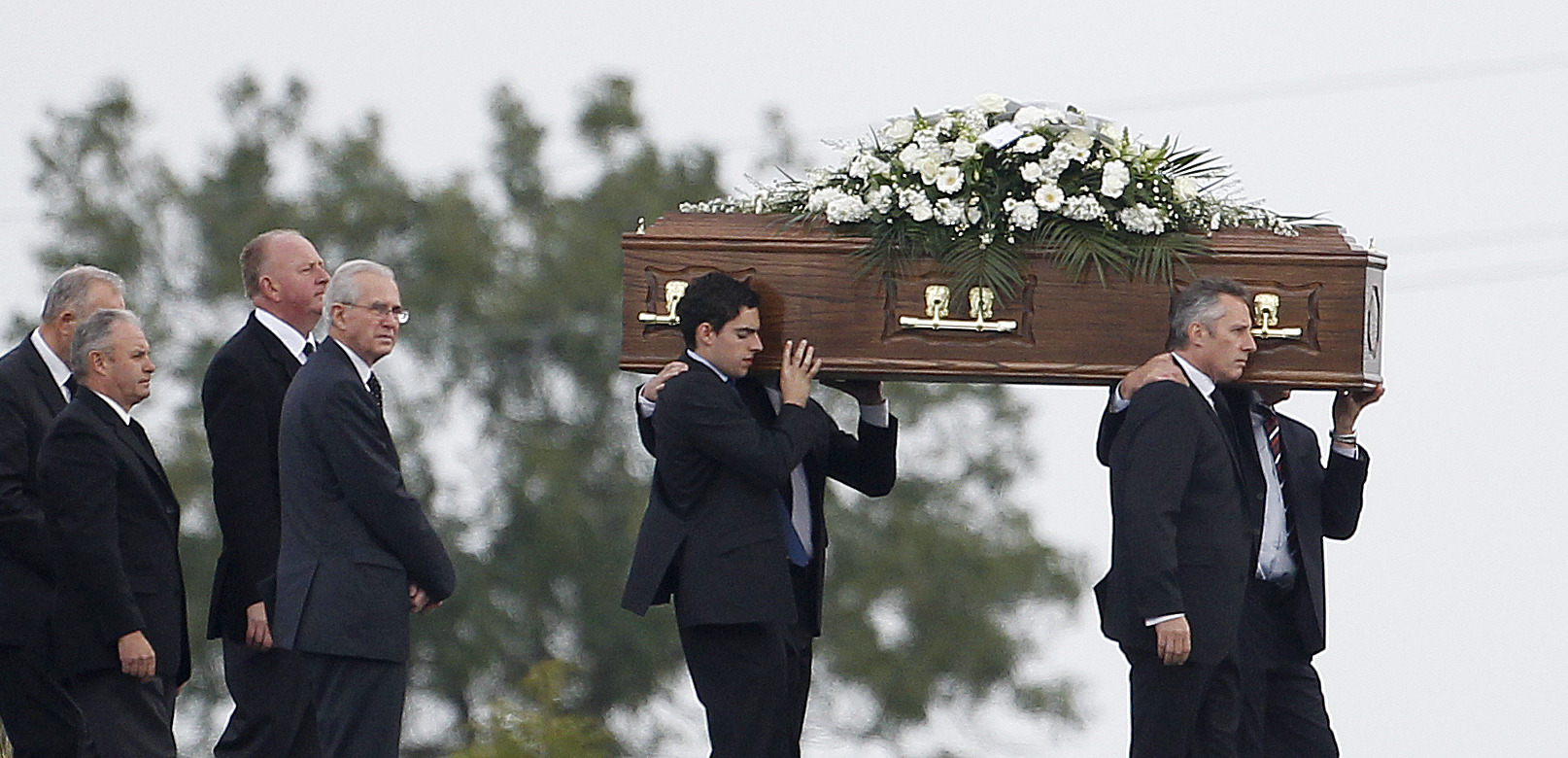 Public praise, private Belfast funeral for Paisley