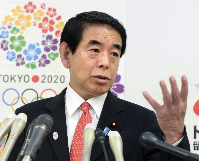 Japan's Education, Culture, Sports and Science Minister Hakubun Shimomura announces the revision of official teaching manuals to emphasize Japan's territorial rights to the islands disputed with China and South Korea, at Education Ministry in Tokyo Tuesday, Jan. 28, 2014. The Education Ministry says Tuesday's decision is to reflect the government's official view on the territorial claims. (AP Phoro/Kyodo News) JAPAN OUT, MANDATORY CREDIT