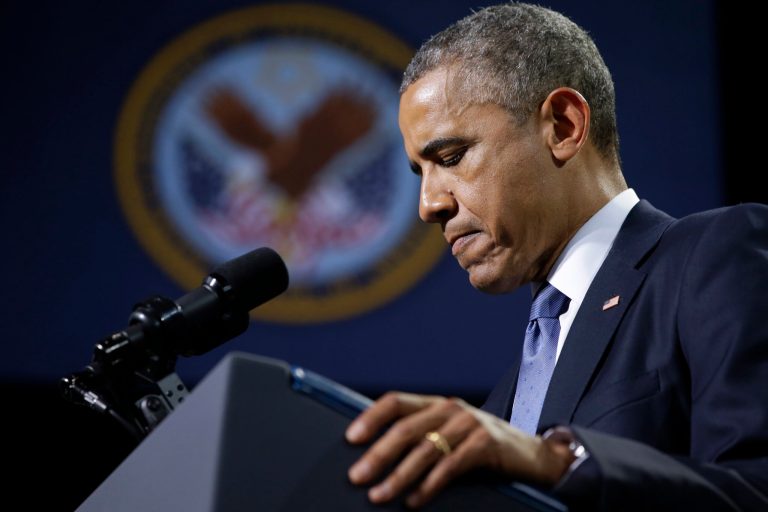 President Obama pauses while speaking about H.R. 3230, the Veterans' Access to Care through Choice, Accountability, and Transparency Act of 2014, Thursday at Fort Belvoir, Va. (AP Photo/Jacquelyn Martin)