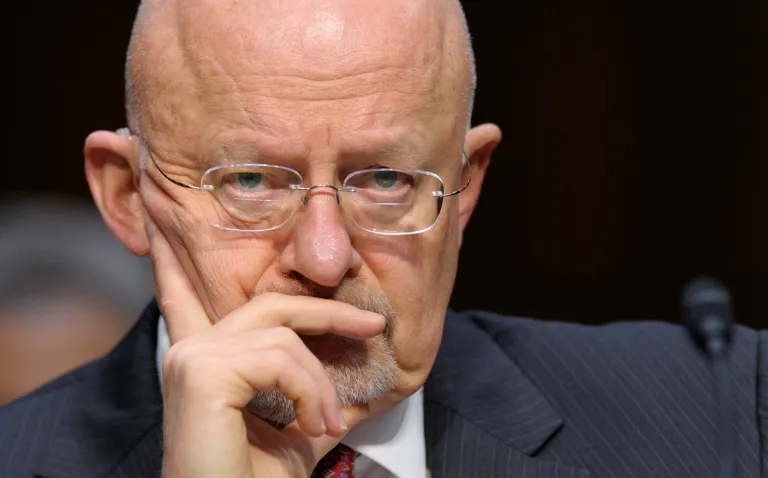 Director of National Intelligence James Clapper listens as he testifies on Capitol Hill in Washington, Tuesday, March 12, 2013, before the Senate Intelligence Committee hearing on worldwide threats. Clapper delivered the U.S. intelligence community's overview of global threats posed by terrorism, cyberattacks, weapons of mass destruction, the months-long civil war in Syria and the unsettled situation in post-Arab Spring nations.