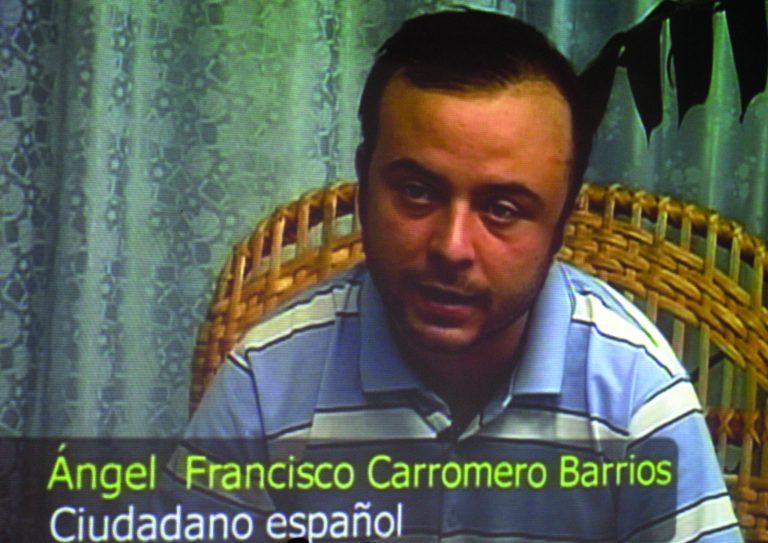 Spanish citizen Angel Francisco Carromero speaks during a press conference via pre-taped video footage that was shown during a press conference organized by Cuba's International Press Center, in Havana, Cuba, Monday, July 30, 2012. Carromero and Swedish citizen Jens Aron Modig, who were traveling with Cuban dissident Oswaldo Paya when he died in a car crash, are denying speculation that a second vehicle was involved. Carromero says he braked abruptly after entering an unpaved construction zone and lost control. (AP Photo/Franklin Reyes)