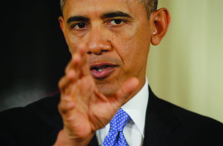 President Barack Obama gestures as he answers a question during a joint news conference with Afghan President Hamid Karzai in the East Room of the White House in Washington, Friday, Jan. 11, 2013. (AP Photo/Pablo Martinez Monsivais)