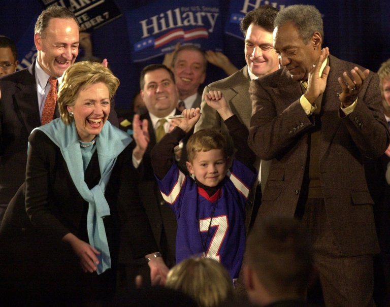 The Drudge Report's front-page splash on the story included a Nov. 6, 2000, Associated Press photo featuring Hillary Clinton and Bill Cosby, as the comedian spoke at a campaign stop at Buffalo State College in Buffalo, N.Y. (AP Photo)